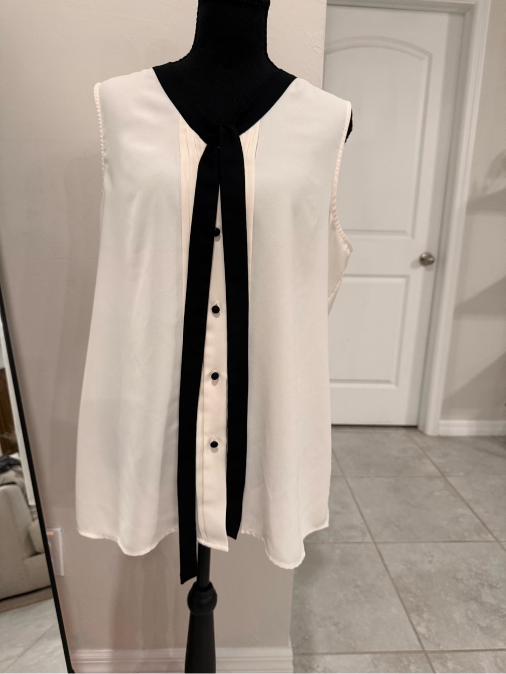 Anne Klein Ivory Sleeveless Blouse with Black Bow and Trim